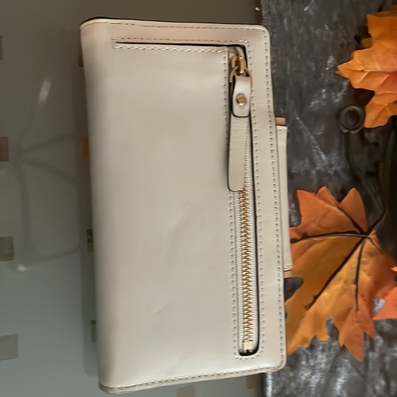 Kate Spade, wallet, new never used.. purchased for $95. Asking $80. - Picture 10 of 11